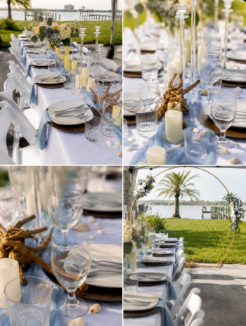 A waterfront wedding tablescape with dusty blue runners, white chairs and a floral hoop arch.
