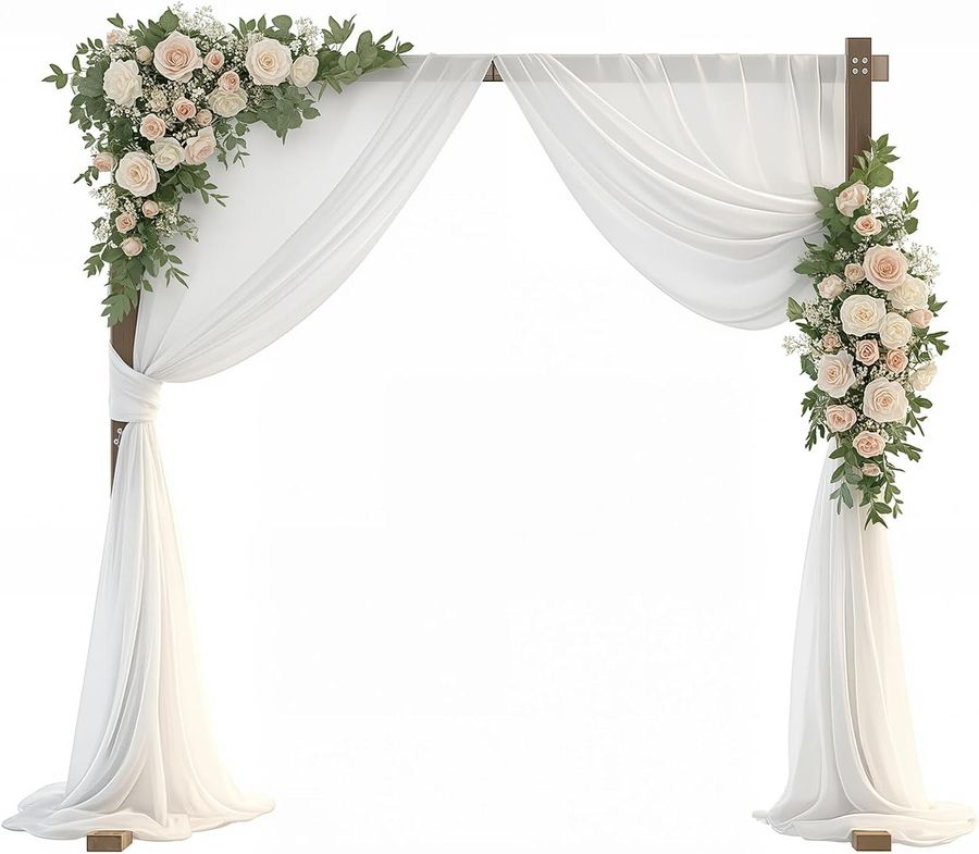 A wooden ceremony arch decorated with draping and florals.