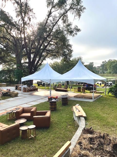 A 20x40 high-peak tent set up for a reception.